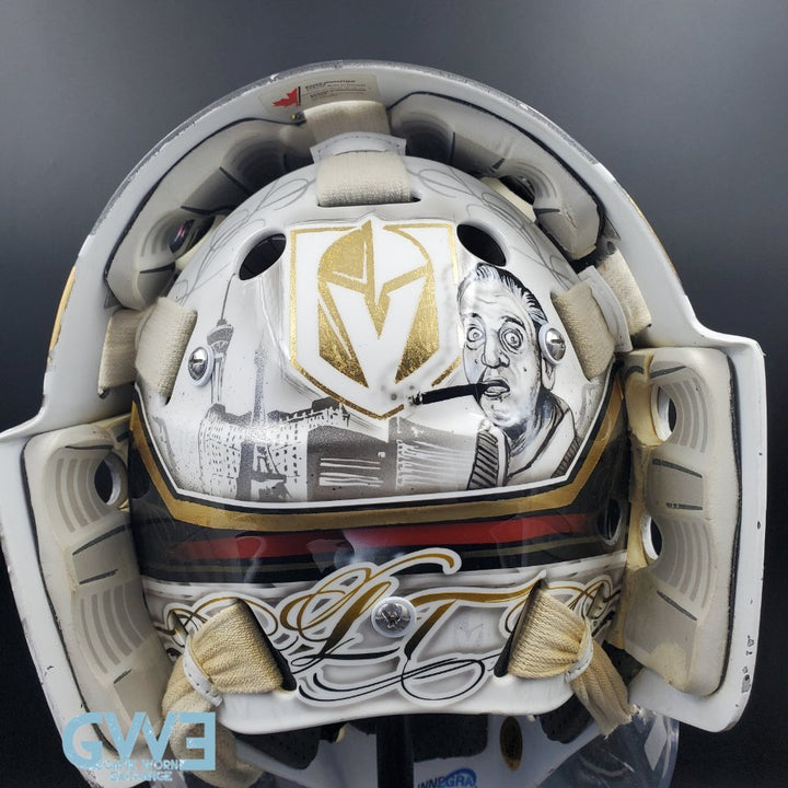 Logan Thompson Game Worn Goalie Mask 2021-22 Las Vegas Golden Knights Painted by Dave Fried Friedesigns on Bauer Shell Photomatched AS-03152