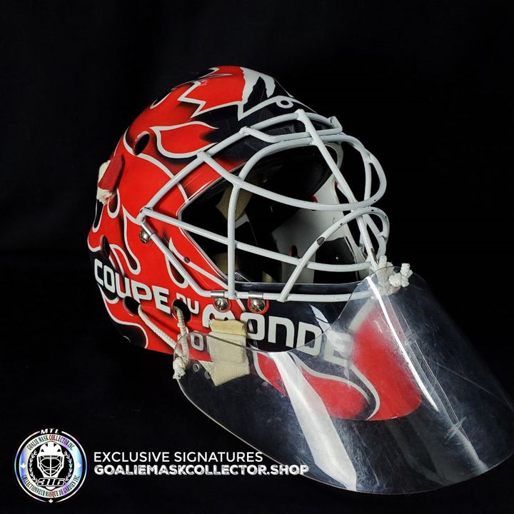 Martin Brodeur Game Worn Used Goalie Mask 2004 Gold Medal Team Canada World Cup Lefebvre CCM Shell + LOA From Brodeur Family + Photomatched + Signed & Inscribed AS-01481 - SOLD