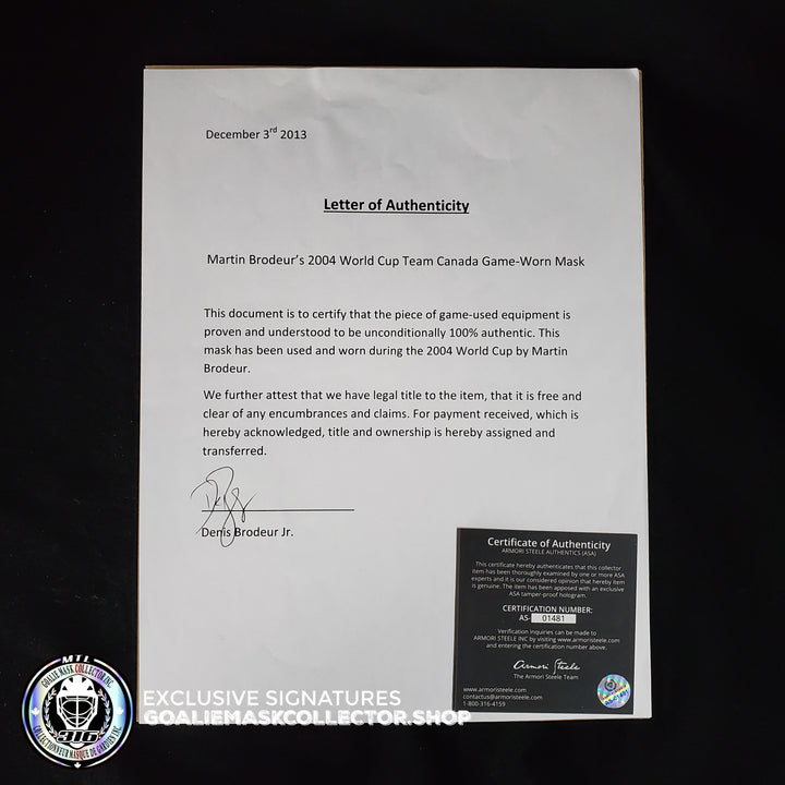Martin Brodeur Game Worn Used Goalie Mask 2004 Gold Medal Team Canada World Cup Lefebvre CCM Shell + LOA From Brodeur Family + Photomatched + Signed & Inscribed AS-01481 - SOLD