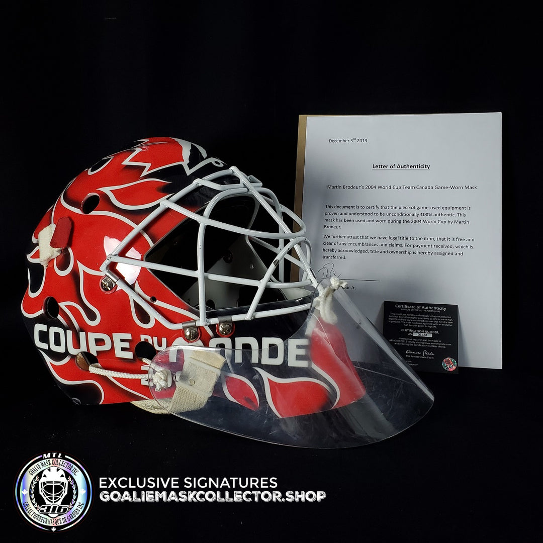 Martin Brodeur Game Worn Used Goalie Mask 2004 Gold Medal Team Canada World Cup Lefebvre CCM Shell + LOA From Brodeur Family + Photomatched + Signed & Inscribed AS-01481 - SOLD